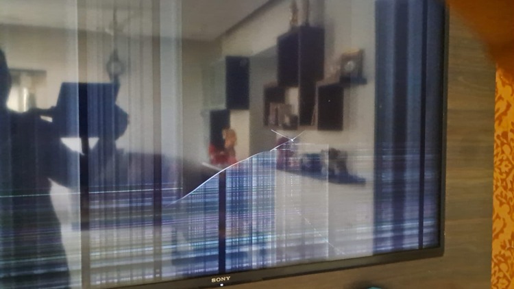 Broken LED TV screen at Wisdom Electronics