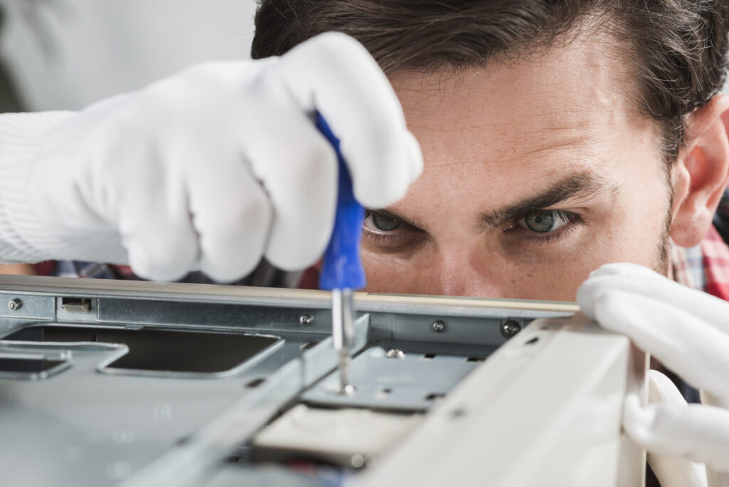 tv backlight repairing a male technician